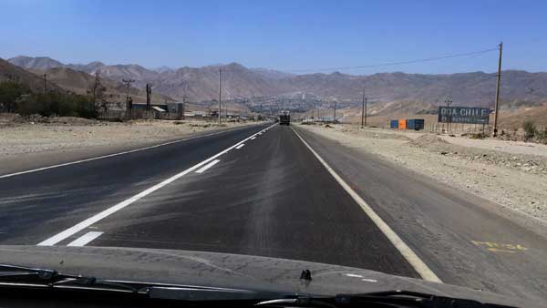 a vast open road in chile.