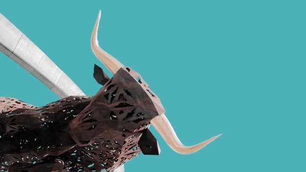 a Bull with horns against a bright blue background - how to invest in stocks UK