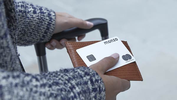 Monzo's sleek silver metal debit card