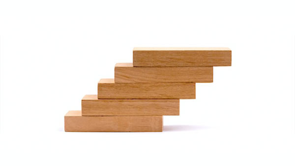 wooden blocks stacked like a staircase